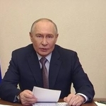 　ロシア政府関係者が参加したオンライン会議で話すプーチン大統領＝１８日（ロシア大統領府提供・共同）