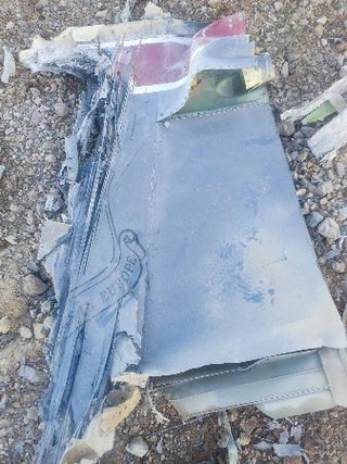 　イラン国営テレビが、撃墜した米機の一部として３日公開した写真（国営テレビ提供、ロイター＝共同）