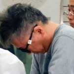 　不同意性交の疑いで送検される伊沢純容疑者＝１日午前、警視庁新宿署