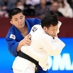 　男子６０キロ級決勝　佐藤星衣（左）に敗れた永山竜樹＝福岡国際センター