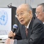 　国連大学で開かれたシンポジウムで発言する明石康・元国連事務次長＝１５日午後、東京都渋谷区