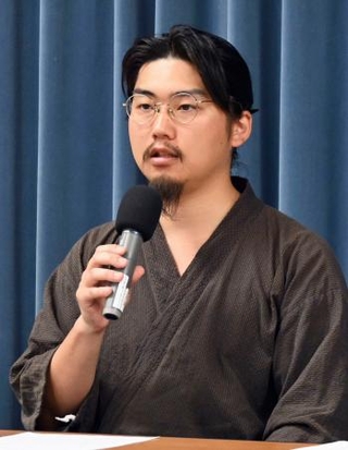 　記者会見する八十島士希さん＝１４日午後、東京都千代田区