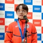 　中京大で開かれたミラノ五輪報告会であいさつする鍵山優真＝１５日、名古屋市