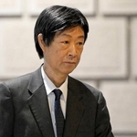 　金融政策決定会合に出席するため、日銀本店に入る内田真一副総裁＝１６日午前（代表撮影）