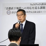 　講演会であいさつするＮＰＯ法人「災害時警友活動支援ネットワーク」の竹内直人さん＝２３日午後、東京都港区