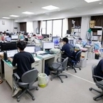 　多くの応援職員が働く石川県穴水町役場の地域整備課＝６月