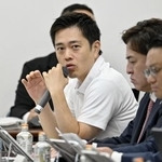 　大阪府と市の法定協議会で発言する吉村洋文知事＝２６日午前、大阪市役所