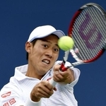 ２０１４年９月、全米オープン男子シングルス決勝でプレーする錦織圭選手＝ニューヨーク（共同）