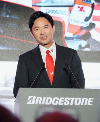 　ブリヂストンがローマで開いた発表会で発言する森田泰博ＣＥＯ＝９月３０日（共同）