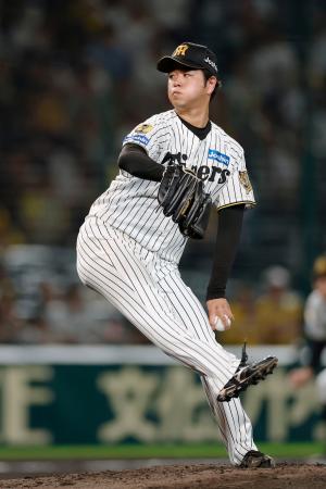 　８回無失点で１６勝目を挙げた阪神・高橋＝甲子園