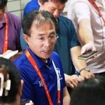 　公式記者会見後に取材に応じる大会組織委の大参孝彰事務局次長＝２２日午後、名古屋市