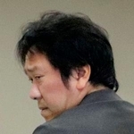　警視庁新宿署に入る三村大介容疑者＝２９日午前１１時３０分