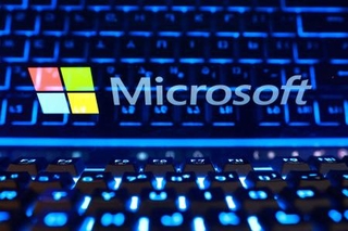 　米マイクロソフトのロゴ＝１９日（ロイター＝共同）