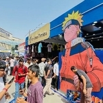 　日本のアニメなどをＰＲするイベント「メラ！メラ！アニメ・ジャパン！！」で、キャラクターが大きく描かれたブース＝３日、インド・ニューデリー（共同）