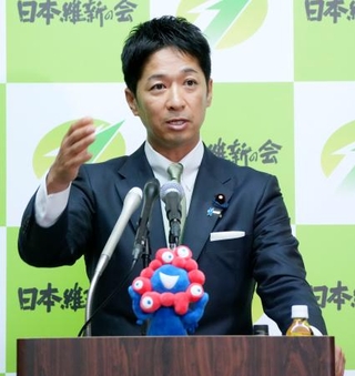 　記者会見する日本維新の会の藤田共同代表＝１９日午後、国会