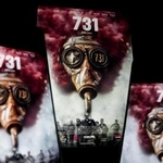 　スマートフォンなどの画面に表示された映画「７３１」の広告（共同）