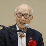 　比叡山延暦寺で開かれた「世界平和祈りの集い」で講演する被団協の田中熙巳代表委員＝４日午後、大津市