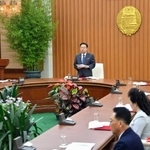 　北朝鮮・平壌の万寿台議事堂で開かれた最高人民会議の常任委員会総会＝１９日（朝鮮中央通信＝共同）