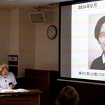 　認定患者だった義母キミ子さんの体験を講話する中坪勇成さん＝２４日午前、富山市
