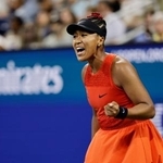 　女子シングルス１回戦でマッチポイントを迎え、ガッツポーズする大坂なおみ＝ニューヨーク（共同）