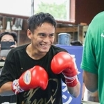 　ＷＢＡミニマム級王座決定戦に向けた練習中に笑顔を見せる高田勇仁＝東京都内