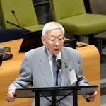 　「核なき世界」を目指す高官級会合で発言する田中聡司さん＝２６日、米ニューヨークの国連本部（共同）