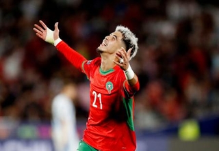 　サッカーのＵ-２０Ｗ杯チリ大会、決勝のアルゼンチン戦で２点目のゴールを決め、喜ぶモロッコのヤシル・ザビリ＝１９日、サンティアゴ（ロイター＝共同）