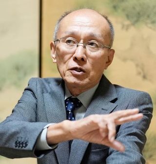 　インタビューに答える、亡くなった高羽奈美子さんの夫悟さん