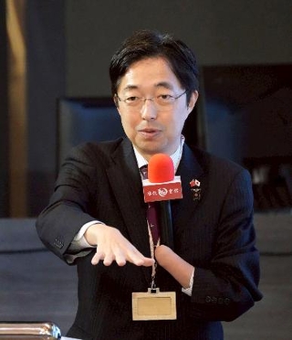 　熊本県が台北市で企業誘致セミナーを開き、あいさつする木村敬知事＝２４日（共同）