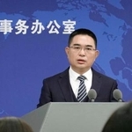 　記者会見する中国国務院台湾事務弁公室の陳斌華報道官＝１２日、北京（共同）