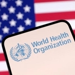 　ＷＨＯのロゴと米国旗（ロイター＝共同）
