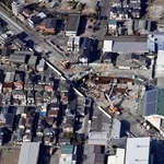 　埼玉県八潮市の県道陥没事故現場。２８日で発生から１年となる＝２５日午後０時３４分（共同通信社ヘリから）