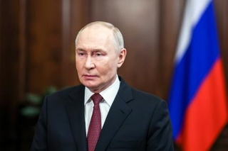 　ロシア大統領府が２３日発表したプーチン大統領のビデオ声明（大統領府提供・タス＝共同）