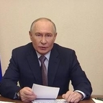 　ロシア政府関係者が参加したオンライン会議で話すプーチン大統領＝１８日（ロシア大統領府提供・共同）