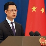 　記者会見する中国外務省の郭嘉昆副報道局長＝１５日、北京（共同）