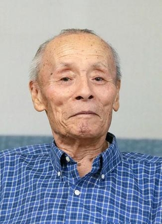 　小山正明さん