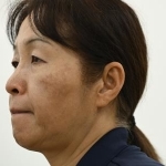 　千葉県市川市の「訪問介護事業所愛ネット」でヘルパー統括業務を担う行田まなみさん。「最近も利用者をみとりました」と話し、涙ぐんだ＝２０２４年９月、千葉県
