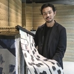 　大阪・関西万博に出展するパビリオンの外装制作を手がけた西陣織の老舗「細尾」の細尾真孝社長＝京都市