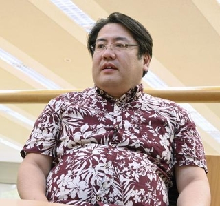 　インタビューに答える情報通信研究機構の鳥澤健太郎フェロー＝２０２４年８月、京都府精華町で撮影