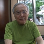 　都内でインタビューに答える上野景文氏