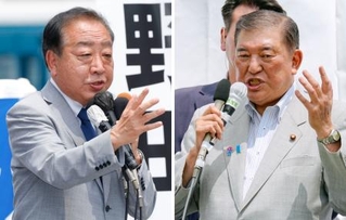 　街頭演説する自民党総裁の石破首相（右）と立憲民主党の野田代表＝４日