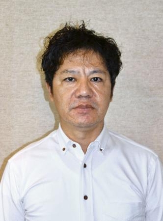 　明治大の勝田忠広教授