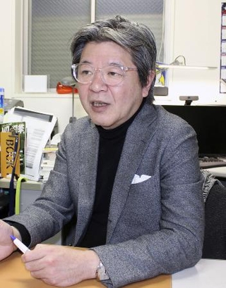 インタビューに答える同志社大の吉田徹教授