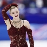 　ミラノ五輪フィギュアスケート女子ＳＰの演技を終え、引き揚げるアンバー・グレン＝ミラノ（共同）