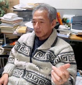 　オンラインで取材に応じる明治大の高峰修教授