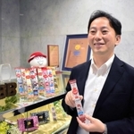 経営課題や今後の戦略について語る六甲バターの塚本浩康副社長＝神戸市中央区坂口通１