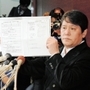 作曲者偽装問題で会見する佐村河内守氏。それまでとは別人のような姿も話題に＝１４年３月、東京都内