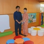 元湯龍泉閣の社長、當谷逸郎さん（左）と妻の麻矢さん。子どもが楽しめるキッズスペースを完成させた＝北区有馬町