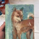 佐野さんが東京・杉並区の古道具屋で購入したという犬の絵。額を外すと絵にそっくりの柴犬の写真が出てきた（佐野さん提供）