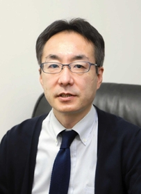 遠隔画像診断を説明するＮＰＯ法人神戸画像診断支援センターの小西淳也副理事長＝神戸市兵庫区荒田町２